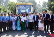 Parnaik flags off school bus donated by NEEPCO