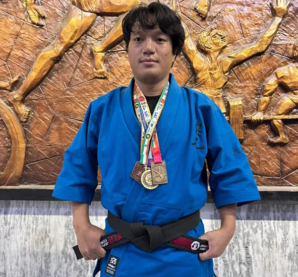 Techi Tagung awarded black belt
