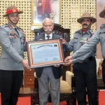 Guv presents citation to 11 AR