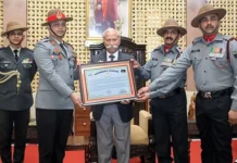 Guv presents citation to 11 AR