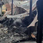 Massive fire destroys two shops