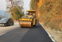 Seppa township road being paved with bituminous concrete